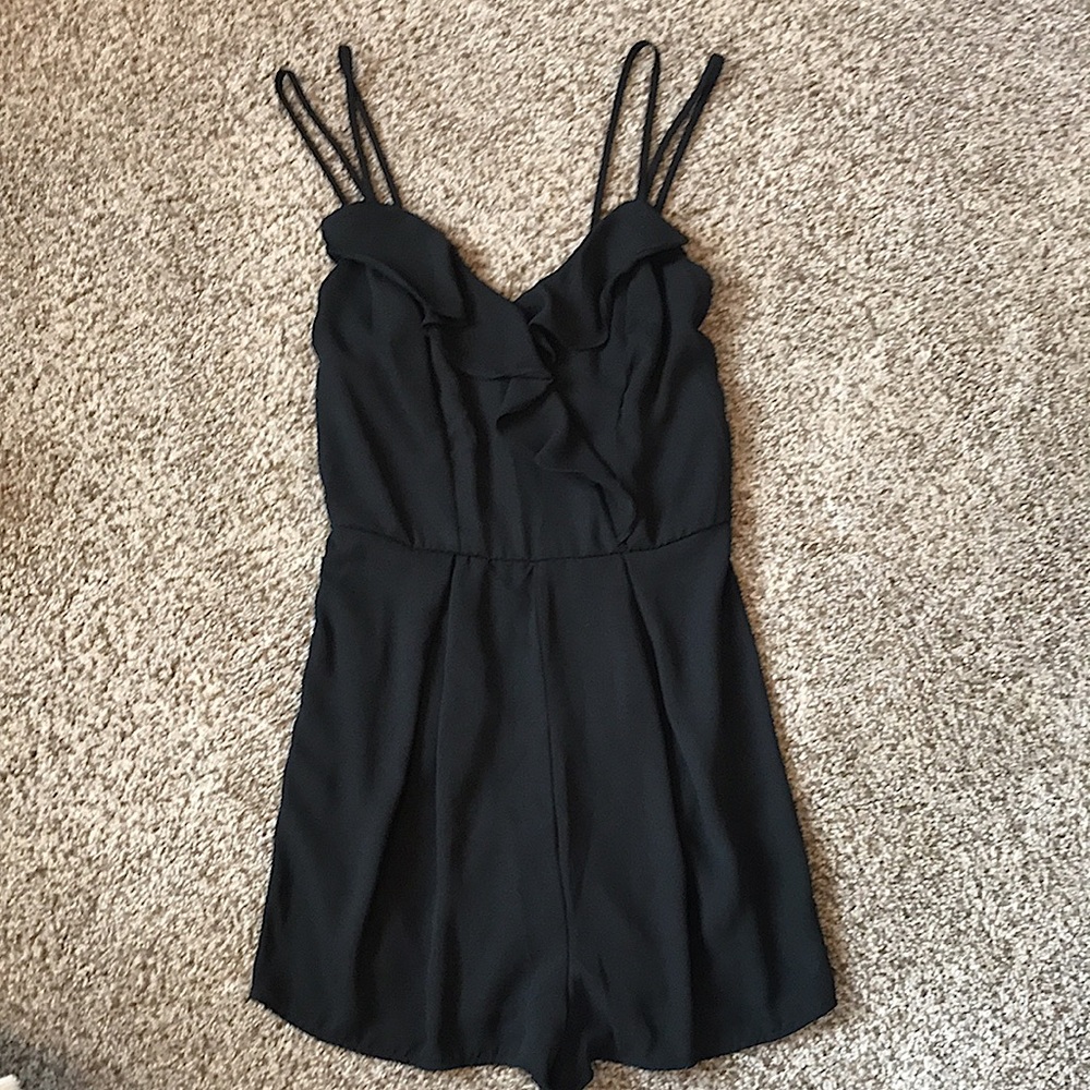 Black double strap fully lined romper w/ ruffles & back zip closure ♥️